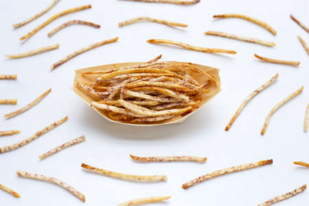 Fried taro sticks on white background.の写真素材