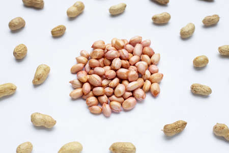 Raw peanuts on white background.の写真素材