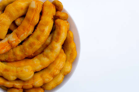 Tamarind pickled fermented on white background.の写真素材