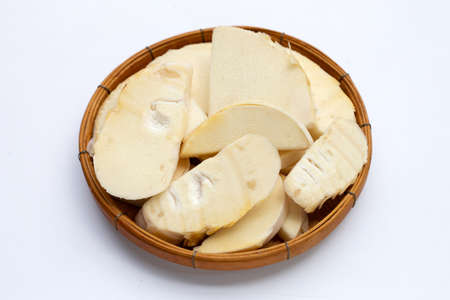 Bamboo shoots in bamboo basket on white backgroundの写真素材