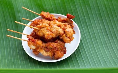 Fried crispy chicken skewers, Thai style street foodの写真素材