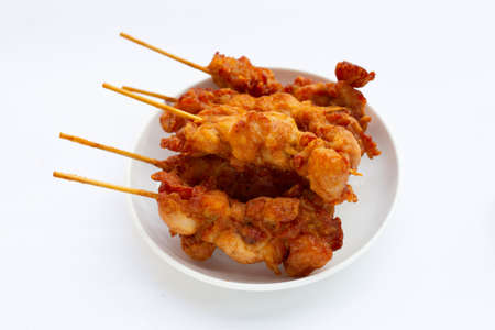 Fried crispy chicken skewers, Thai style street foodの写真素材