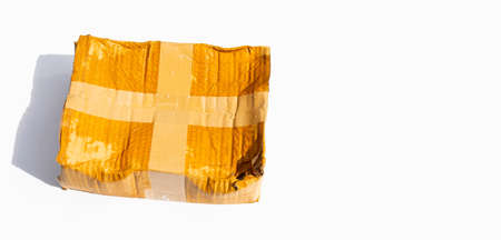 Damaged cardboard box with hole, Broken and wet product packaging