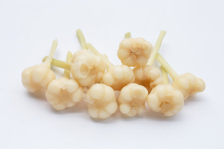 Pickled garlic on white background.