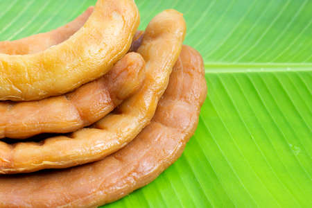 Tamarind pickled fermented on banana leafの写真素材