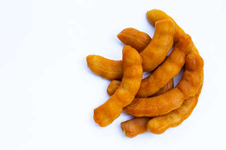 Tamarind pickled fermented on white background.の写真素材