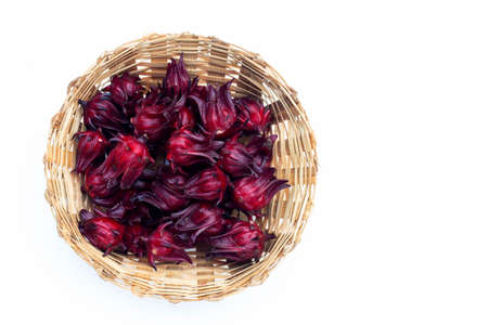 Roselle flower in bamboo basketの写真素材