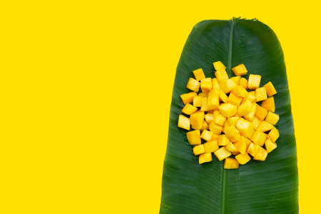 Tropical fruit, Mango cube slices on banana leafの写真素材