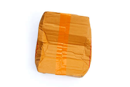 Damaged cardboard box on white background.