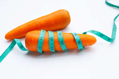 Carrot wrapped in measuring tape