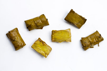 Bundled boiled rice on whiteの写真素材