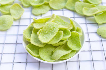 Prawn crackers on white background. Shrimp crispy rice snack