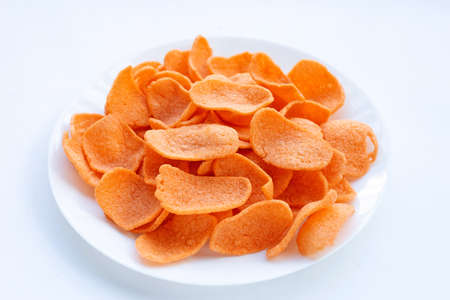 Prawn crackers on white background. Shrimp crispy rice snack