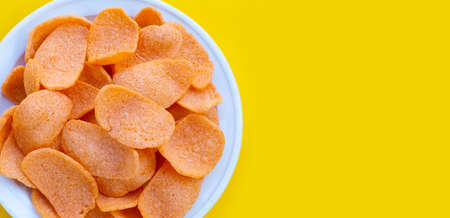 Prawn crackers on white background. Shrimp crispy rice snack