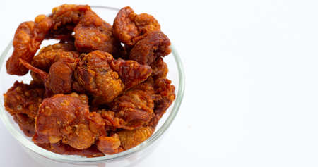 Chispy fried chicken skin in glass bowlの写真素材