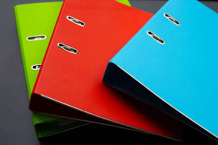 Office folders on dark background.の写真素材