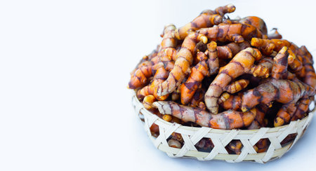 Turmeric roots on white background.の写真素材