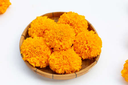 Marigold flowers in bamboo basket