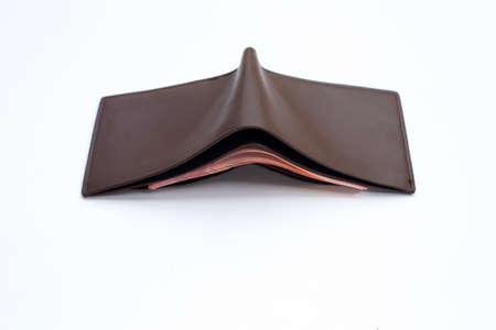 Brown wallet on white background