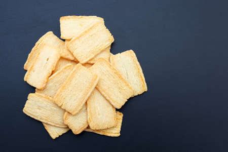 Cheese crispies on dark background.の写真素材