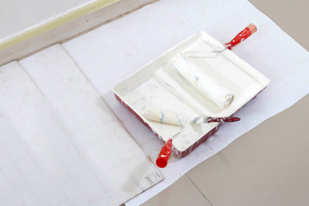 Paint rollers and brush in paint trayの写真素材