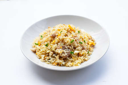 Fried rice in white plate on white background.の写真素材