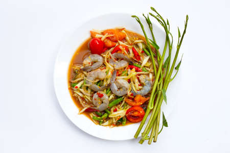 Papaya salad with shrimp in white plateの写真素材