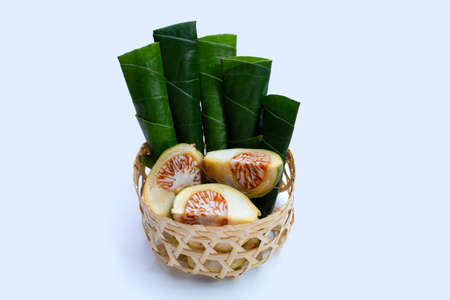 Chewing betel nut, Betel nut with cal lime powder in betel leavesの写真素材