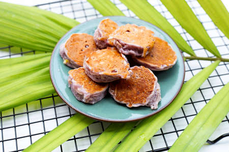 Coconut pancake on white background.