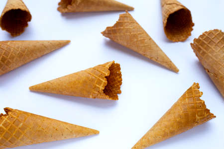 Empty ice cream cone on white background.
