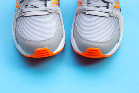 Sneakers shoes on blue background.の写真素材