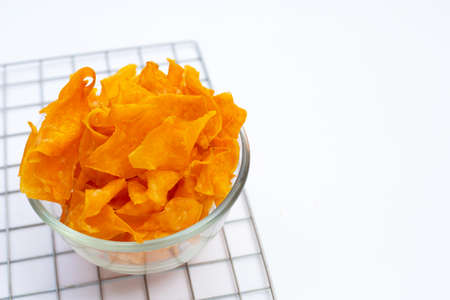 Sweet potato chips on white background.の写真素材