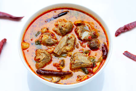Thai food, Spicy soup with pork ribs on white background.の写真素材