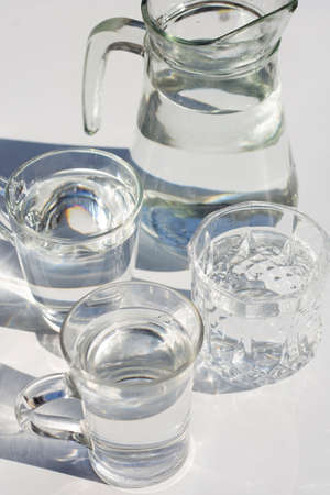 Glasses with water on white backgound.の写真素材