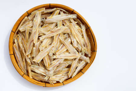 Dried anchovies on white background.の写真素材