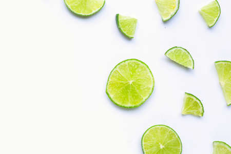 Lime slices on white background. Top viewの写真素材