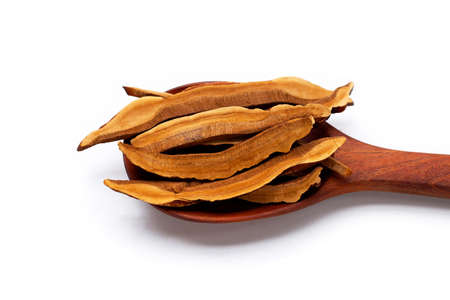 Dried lingzhi mushroom slices on white background