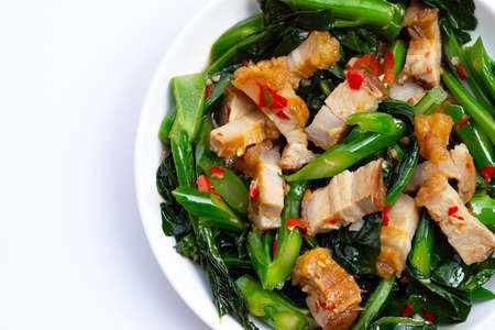 Stir fried chinese kale with crispy pork bellyの写真素材