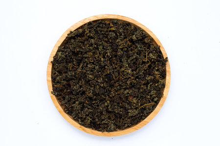 Dried Jiaogulan on white background.