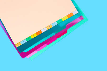 Office folders on blue background.