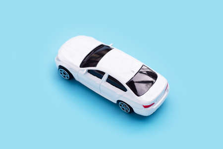 Toy car on blue backgroundの写真素材