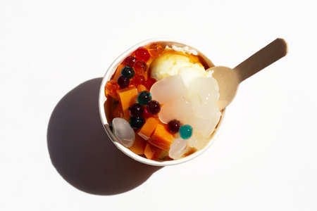 Ice cream cup with toppingの写真素材