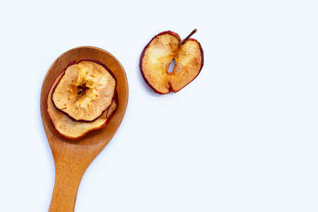 Dried apple slices on white background
