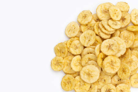 Banana slice chips on white background.の写真素材