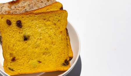 Stack of bread slices with whole grainsの写真素材