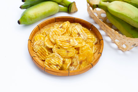 Banana slice chips on white background.の写真素材