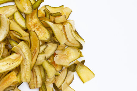 Green banana chips with peelの写真素材