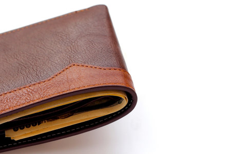 Brown wallet on white background.