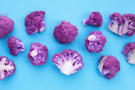 Purple cauliflower on blue background.の写真素材