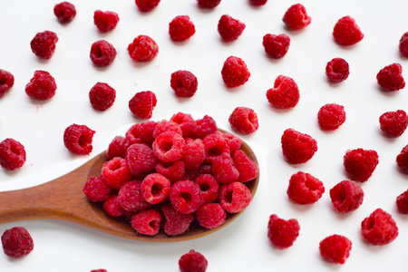 Fresh raspberries on white background.の写真素材